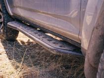 Step Edition Rock Slider For 24-Present Toyota Tacoma/Double Cab Short Bed W/ No Kick Out/Yes (Bed Liner)/Raw Steel Cali Raised LED
